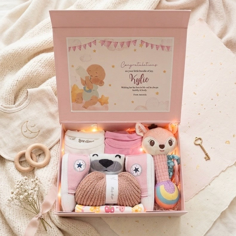 Baby girl newborn gift hamper Singapore with pink essentials and baby care items