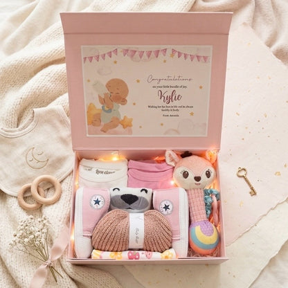 Baby girl newborn gift hamper Singapore with pink essentials and baby care items