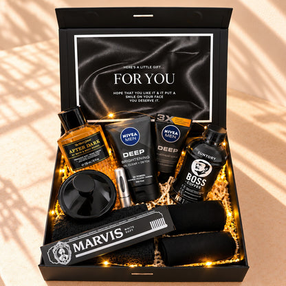 Close-up of Caring Pair Men's Self-Care Gift Box with black satin message card and fairy lights